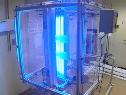 An interdisciplinary team of engineers and scientists from Rensselaer Polytechnic Institute (RPI) and the Lighting Enabled Systems & Applications (LESA) center has designed and test a disinfection chamber, utilizing ultraviolet radiation, for sterilizing masks used as personal protective equipment. (Photo credit: image courtesy of LESA/RPI.) An interdisciplinary team of engineers and scientists from Rensselaer Polytechnic Institute (RPI) and the Lighting Enabled Systems & Applications (LESA) center has designed and test a disinfection chamber, utilizing ultraviolet radiation, for sterilizing masks used as personal protective equipment. (Photo credit: image courtesy of LESA/RPI.)