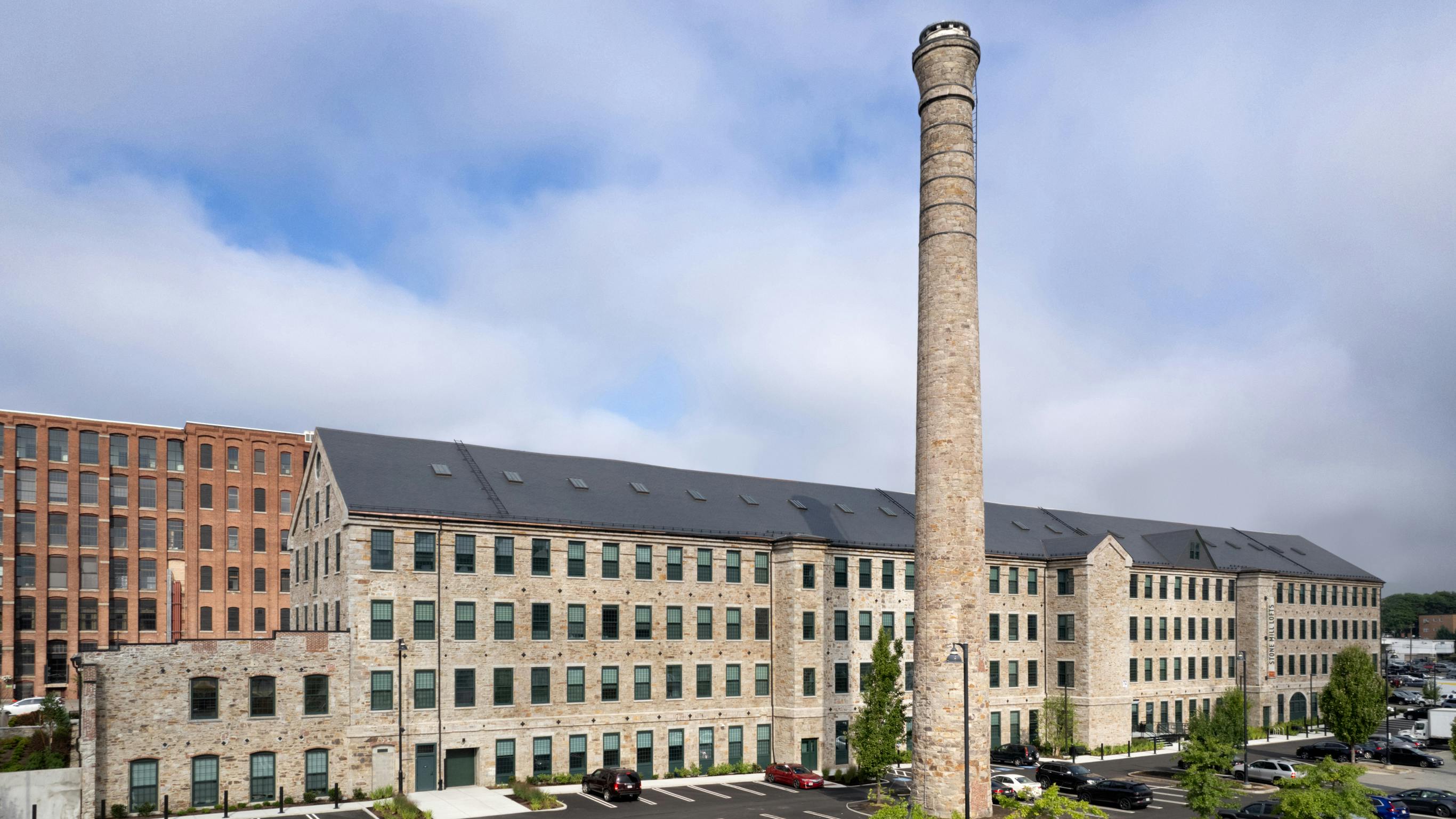 Exterior of the historic and newly renovated Stone Mill Lofts in Lawrence, Mass.