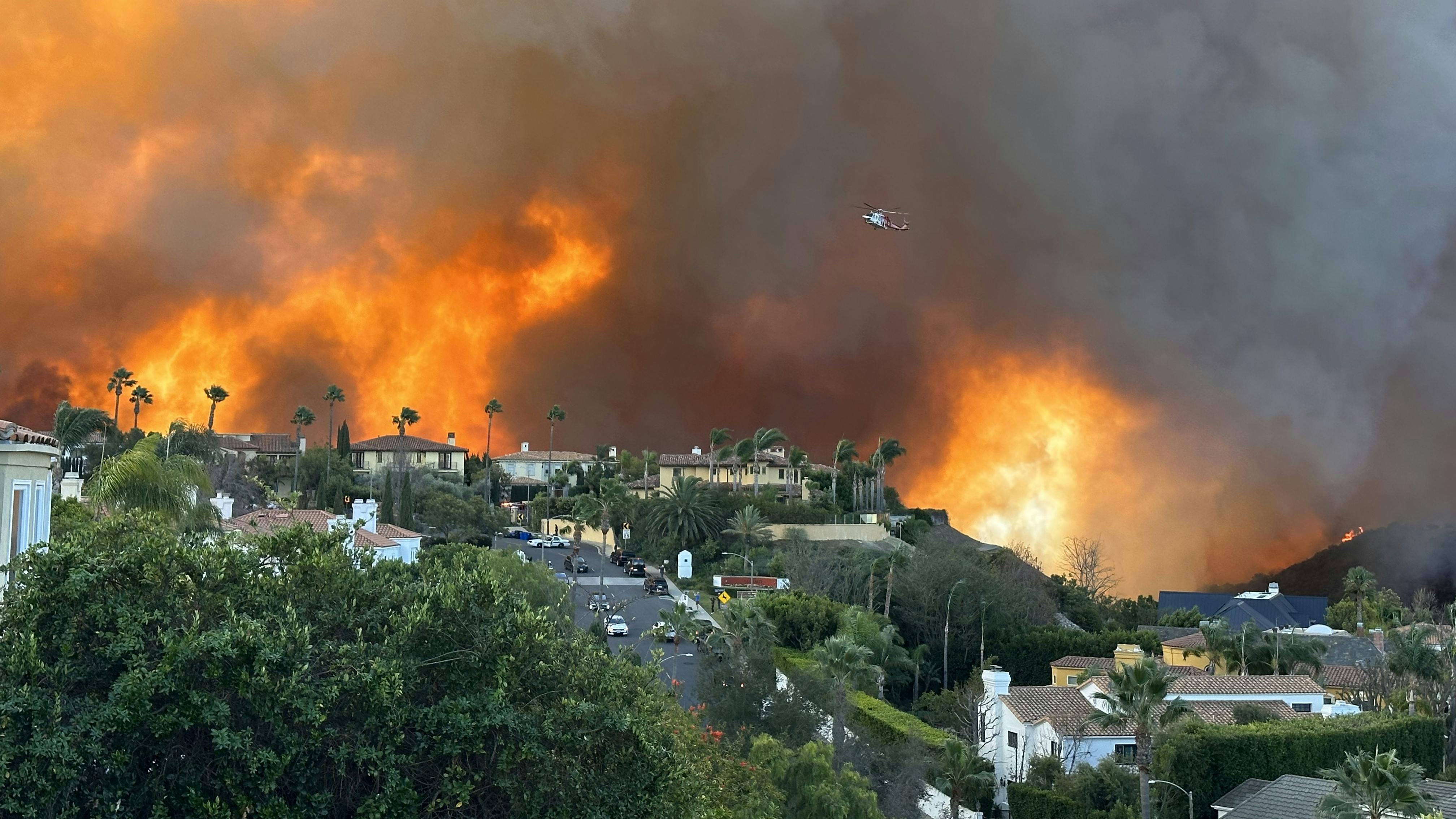 The wildfires in Los Angeles in January 2025 consumed buildings and vehicles, releasing hazardous pollutants into the air. Here, the Palisades fire burns on January 7, 2025.