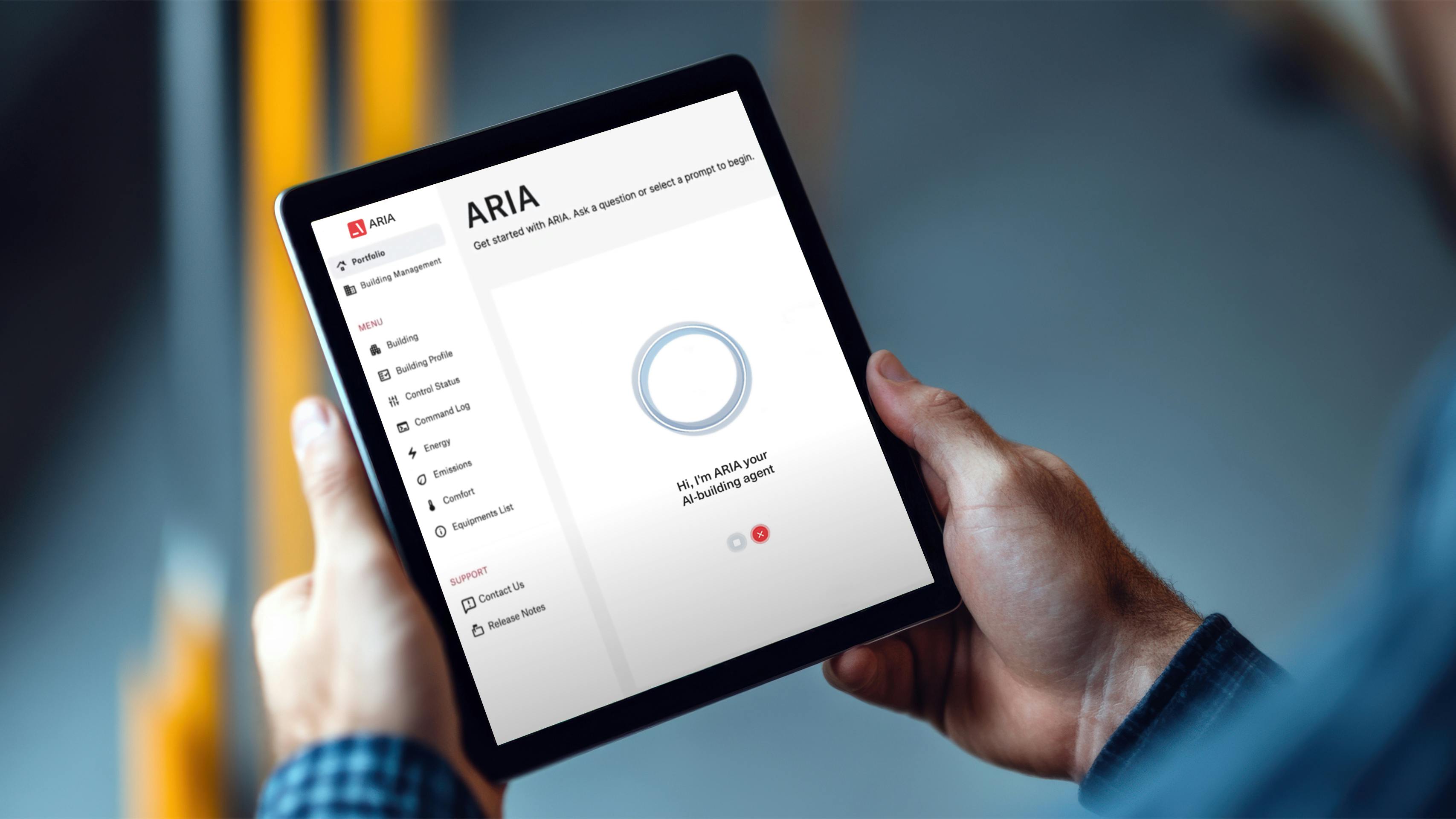 worker_holding_digital_tablet_with_blank_white_scr