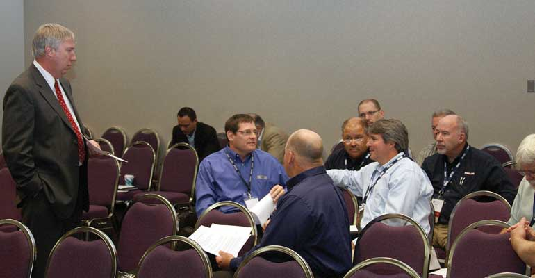 Ken Shafer discusses tank corrosion issues with a small group of attendees during the National Tank Truck Carriers 2012 Tank Truck Show amp Maintenance Seminar October 2224 in Louisville Kentucky
