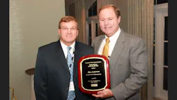Jim Anderson right vicepresident of safety for Florida Rock amp Tank Lines Inc received a plaque recognizing him as 2011 Tank Truck Safety Director of the Year The plaque was presented by Mark Harvey Heil Trailer International Anderson was honored for directing the safety operations that led to Florida Rock amp Tank Lines winning the NTTC 2011 Outstanding Performance Trophy sponsored by Heil Trailer International Jim Anderson right vicepresident of safety for Florida Rock amp Tank Lines Inc received a plaque recognizing him as 2011 Tank Truck Safety Director of the Year The plaque was presented by Mark Harvey Heil Trailer International Anderson was honored for directing the safety operations that led to Florida Rock amp Tank Lines winning the NTTC 2011 Outstanding Performance Trophy sponsored by Heil Trailer International