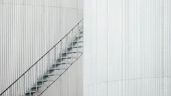 Negative Space Grey Iron Staircase Between Two Buildings 62991d1031a5c Negative Space Grey Iron Staircase Between Two Buildings 62991d1031a5c