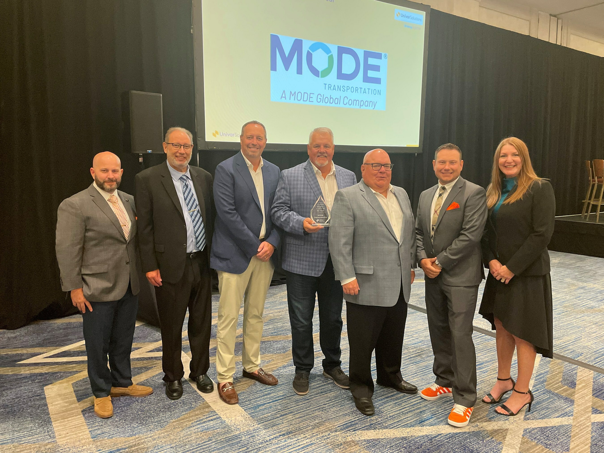 From left to right are Travis Vedral, Univar director of transportation; Ken Spicer, Univar director of central transportation; Mode SVP Todd Thompson; Terry Shirley, Mode VP of business development; Dan Egan, Mode VP of sales; Brandon Ruggles, Univar director of east transportation; and Darica Schneider, Univar director of west transportation.