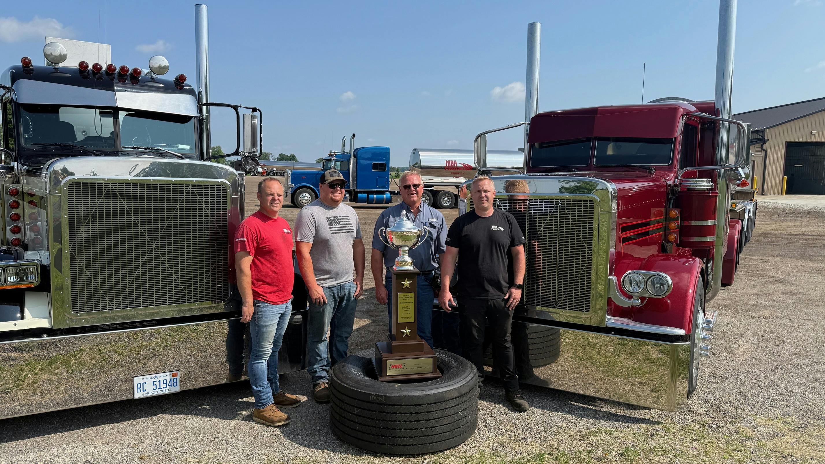 From left to right are Rick, Ryan, Brian, and Jordan Hitchcock. Rick and Jordan work with Brian at MBH Trucking; and Brian's youngest son, Ryan, owns an excavating company.