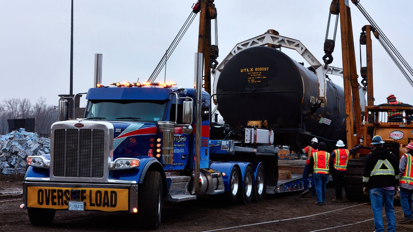 A truck transports the oversized load to the Calumet City public safety training center, where first responders will receive hands-on training to ensure they are better prepared for emergency responses involving rail tank cars and hazardous materials.