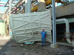 A storm blew down the fan housing of a cooling tower. A storm blew down the fan housing of a cooling tower.