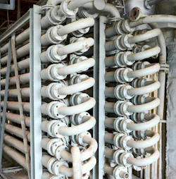 Figure 4. The hairpin heat exchanger includes end closures, which allow for thermal movements without expansion joints and the removal of tubes. Figure 4. The hairpin heat exchanger includes end closures, which allow for thermal movements without expansion joints and the removal of tubes.