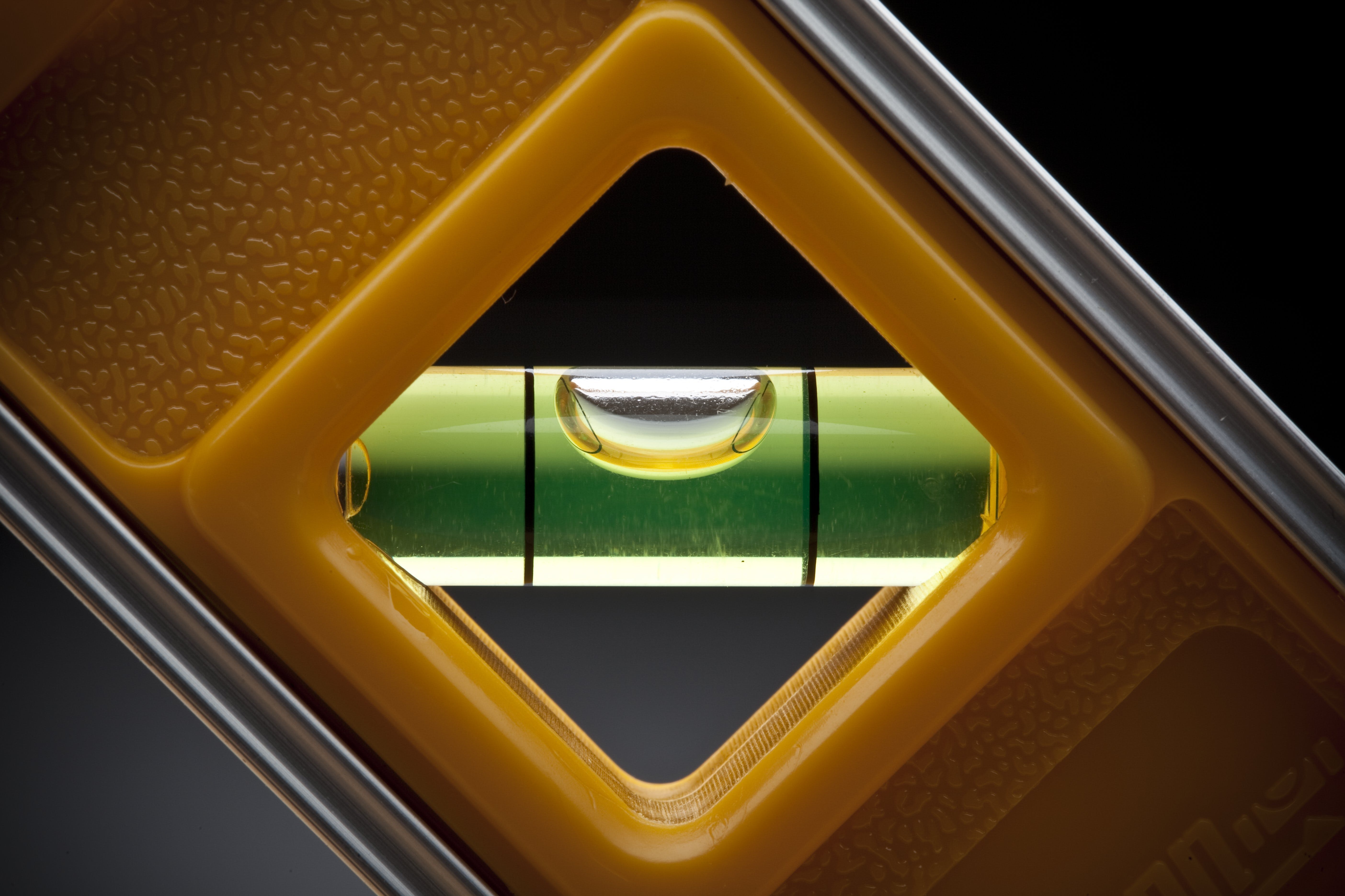 Leveling tool on a dark background