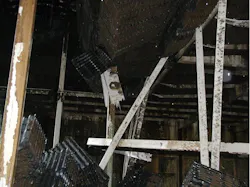 Figure 4. Cooling tower fill and support beams that have collapsed into the tower basin from excessive loading. Photo courtesy of Rich Aull, Richard Aull Cooling Tower Consulting, LLC. Figure 4. Cooling tower fill and support beams that have collapsed into the tower basin from excessive loading. Photo courtesy of Rich Aull, Richard Aull Cooling Tower Consulting, LLC.