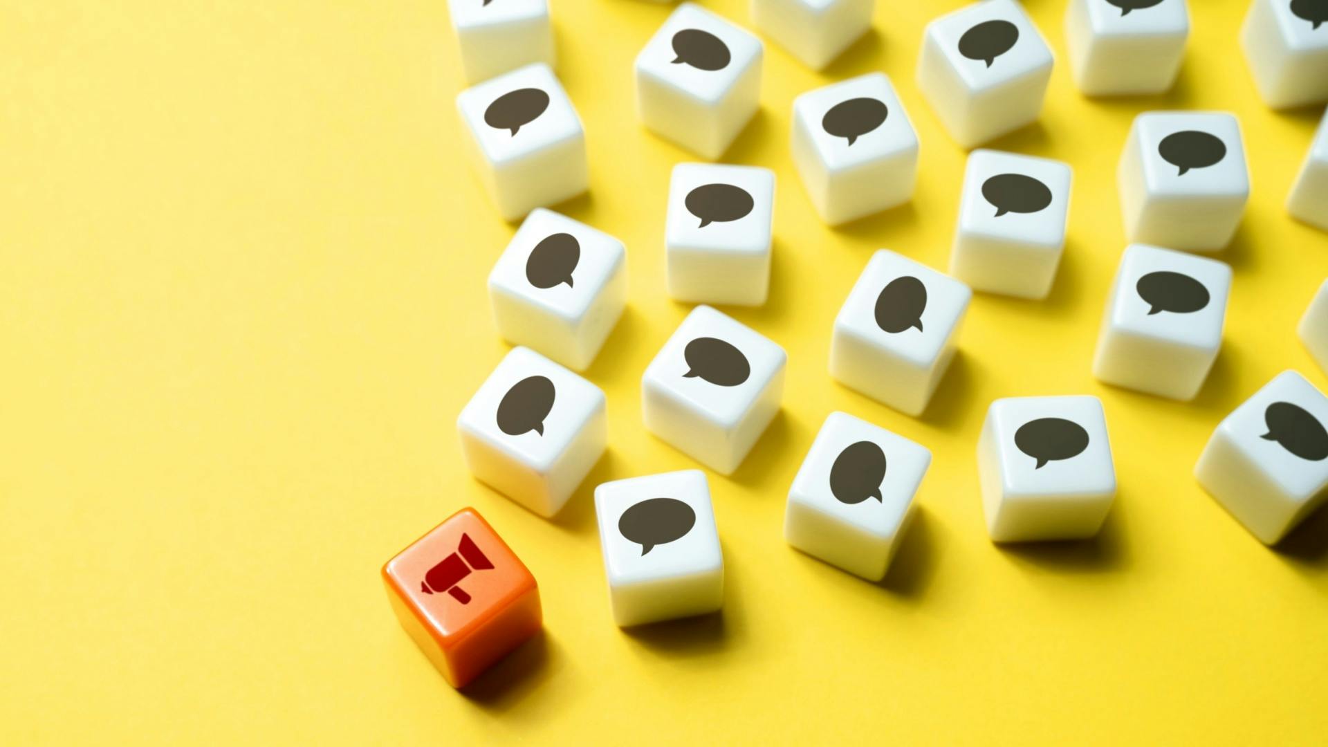 bullhorn surrounded by speech bubbles