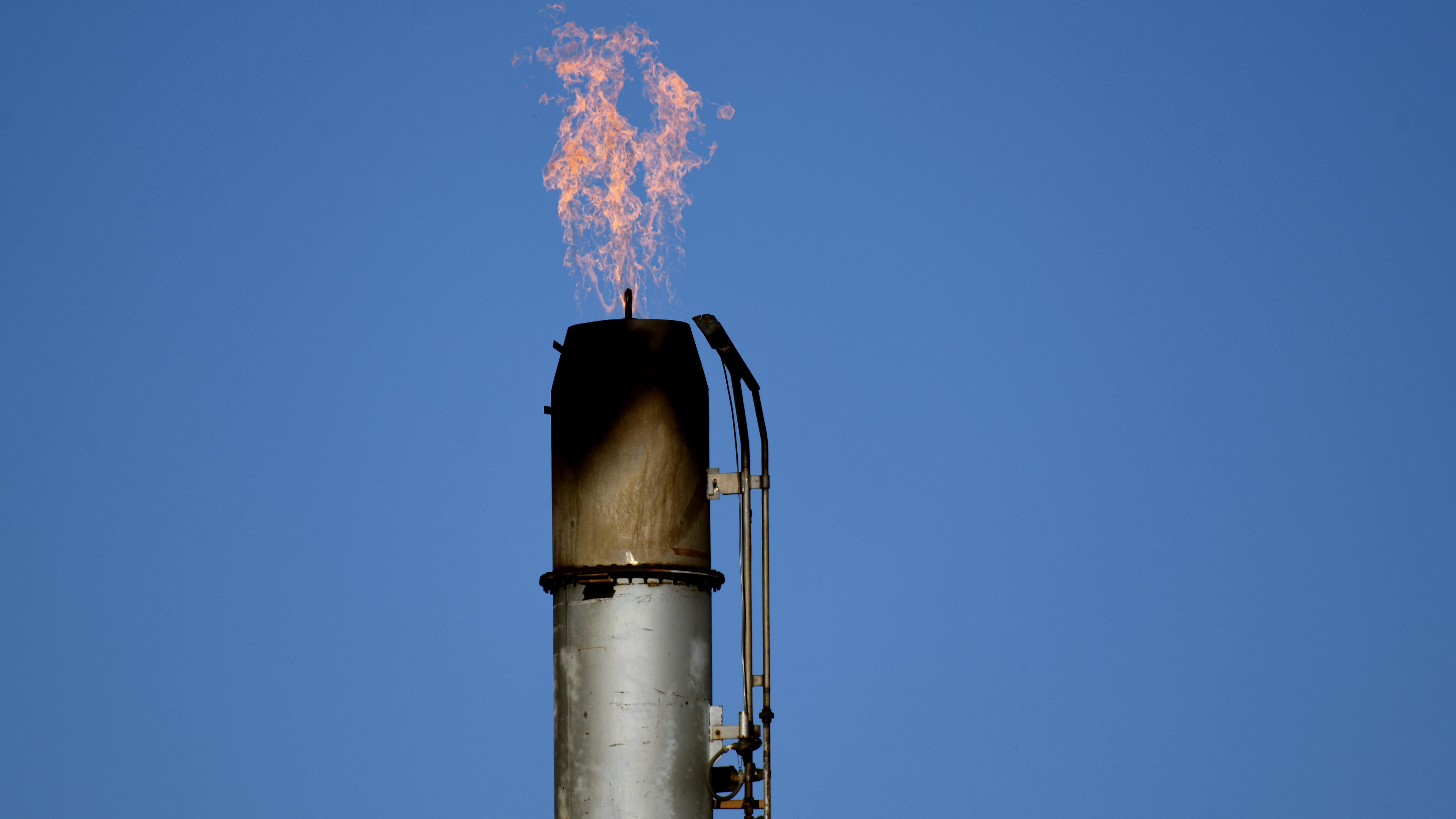 Gas flares into the sky at the Suncor Energy oil refinery in Commerce City, Colorado, on Wednesday, July 26, 2023.