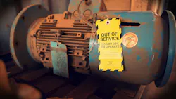 Safety workplaces yellow out of service tag attached on faulty damage defect of electric power motor. Safety workplaces yellow out of service tag attached on faulty damage defect of electric power motor.