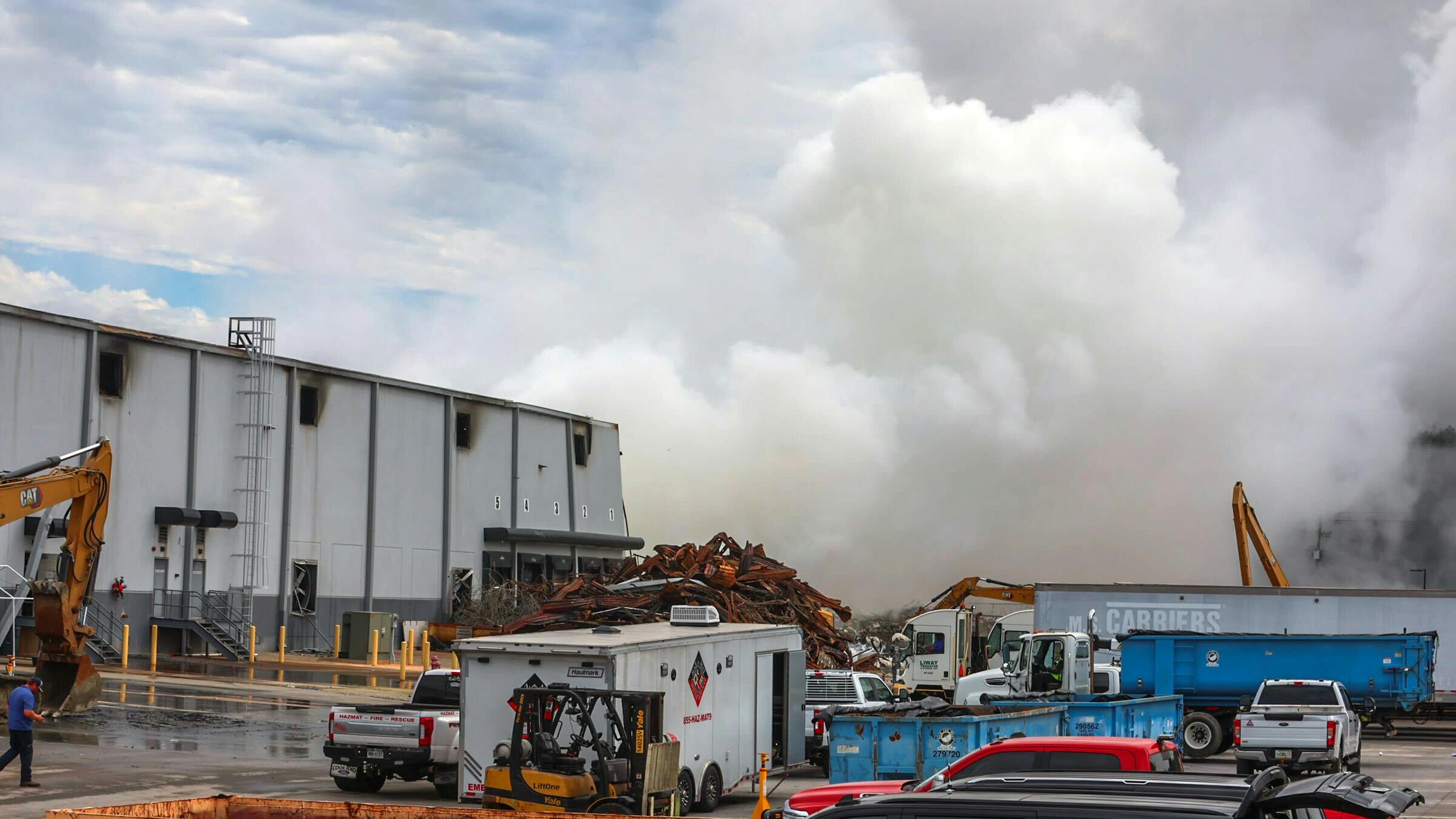 A large plume caused by a chemical reaction is visible over the BioLab facility in Conyers, Georgia, where a fire broke out Sept. 29, 2024.