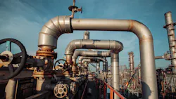 pipes and valves in a chemical plant pipes and valves in a chemical plant