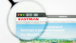 Magnifying glass hovers over Eastman logo on computer screen Magnifying glass hovers over Eastman logo on computer screen