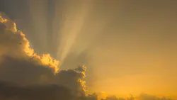 Clouds with sun rays behind them Clouds with sun rays behind them