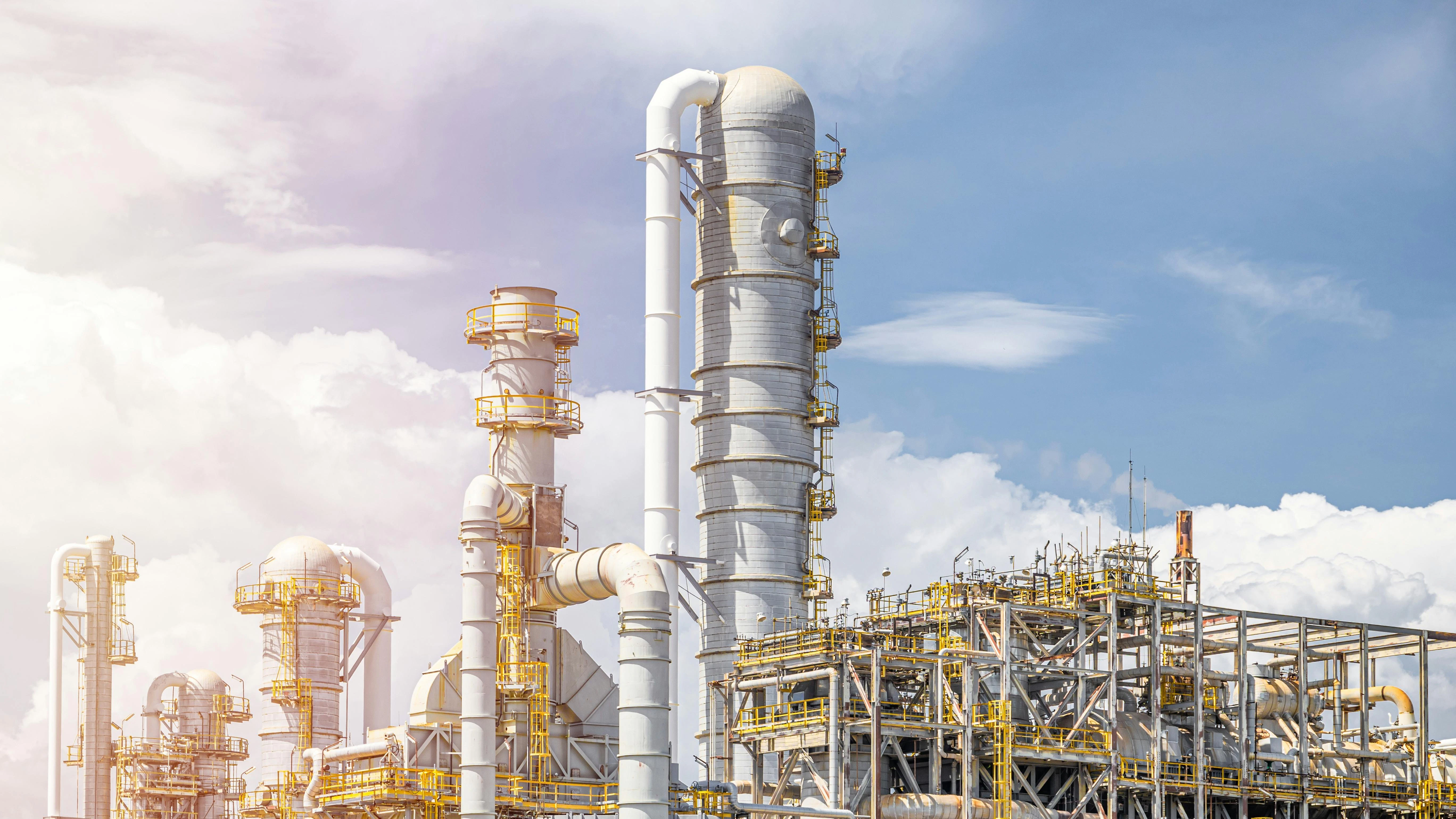 Oil petroleum refinery plant building distillation columns tower