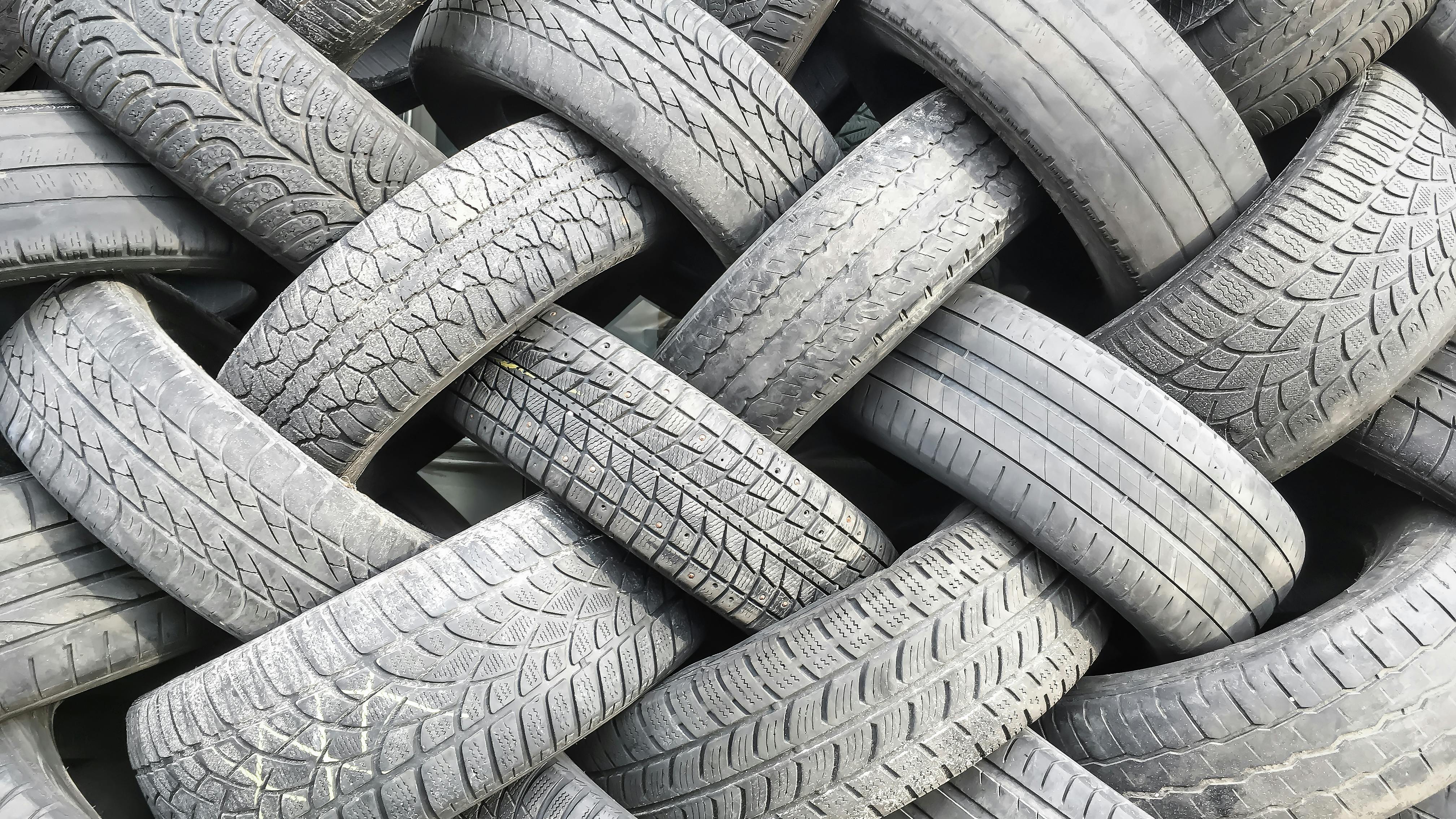 A pile of old used tires close-up