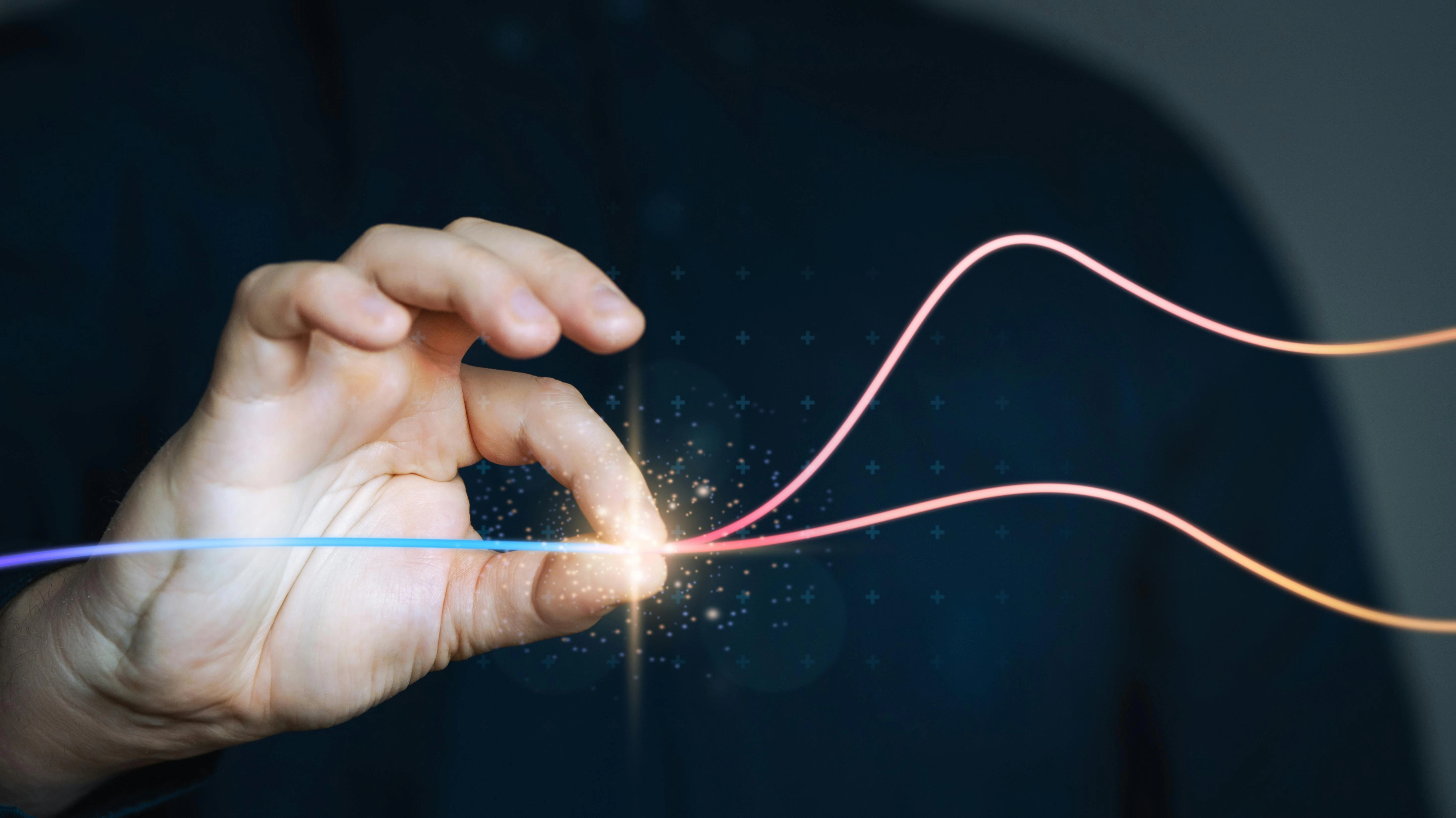 Hand 'pinches' digital wave thread, concept for pinch analysis