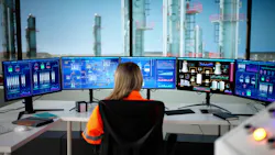 Young Female Engineer Monitoring Oil And Gas Production With Scada. Young Female Engineer Monitoring Oil And Gas Production With Scada.