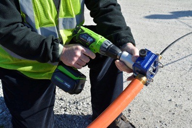 The handheld version of the ULTIMAZ Point-to-Point Hybrid Fiber Drop Installation System enables the installation of fiber-optic cable through CableJetting, at speeds up to 600 feet per minute. The ULTIMAZ also is available in a stand-mounted version.