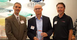 Rosenberger OSI's Clemens Wurster (center) and Ryan Chappell (right) pose with the company's 2018 Cabling Innovators Platinum Award. Rosenberger OSI's Clemens Wurster (center) and Ryan Chappell (right) pose with the company's 2018 Cabling Innovators Platinum Award.