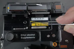 Remove fiber chards and fiber jacket debris. Remove fiber chards and fiber jacket debris.