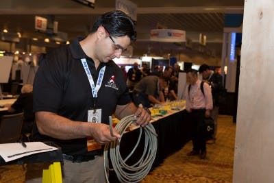 Alberto Luna, a 2-time Installer of the Year, competes during the Cabling Skills Challenge.