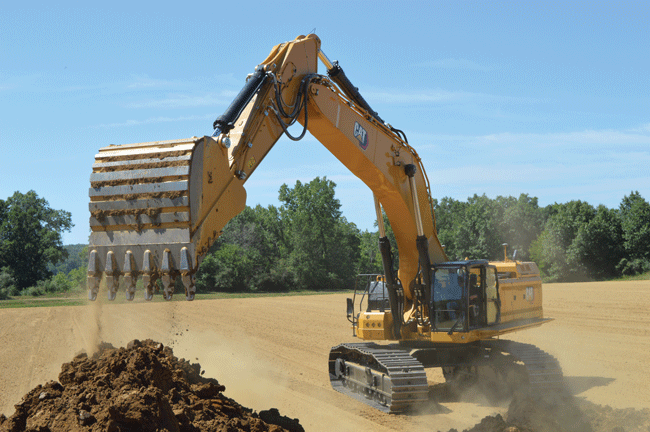 1654723390046 Cat395excavatorworkspile