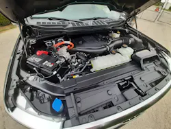 Shrouding, plumbing, and wiring hide the twin-turbo V-6 that’s backed by an electric motor. Only the PowerBoost name and orange-wrapped wiring (carrying 400 volts in this system) hint that this is a fuel-saving and performance-enhancing hybrid powertrain. Shrouding, plumbing, and wiring hide the twin-turbo V-6 that’s backed by an electric motor. Only the PowerBoost name and orange-wrapped wiring (carrying 400 volts in this system) hint that this is a fuel-saving and performance-enhancing hybrid powertrain.