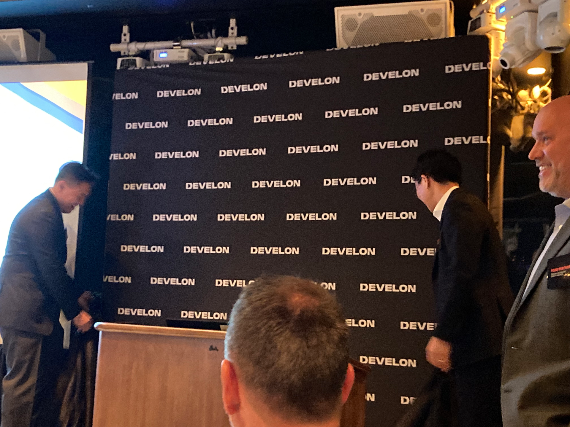 The new brand is unveiled. From left: Edward Song, Chris Jeong, and Todd Roecker.