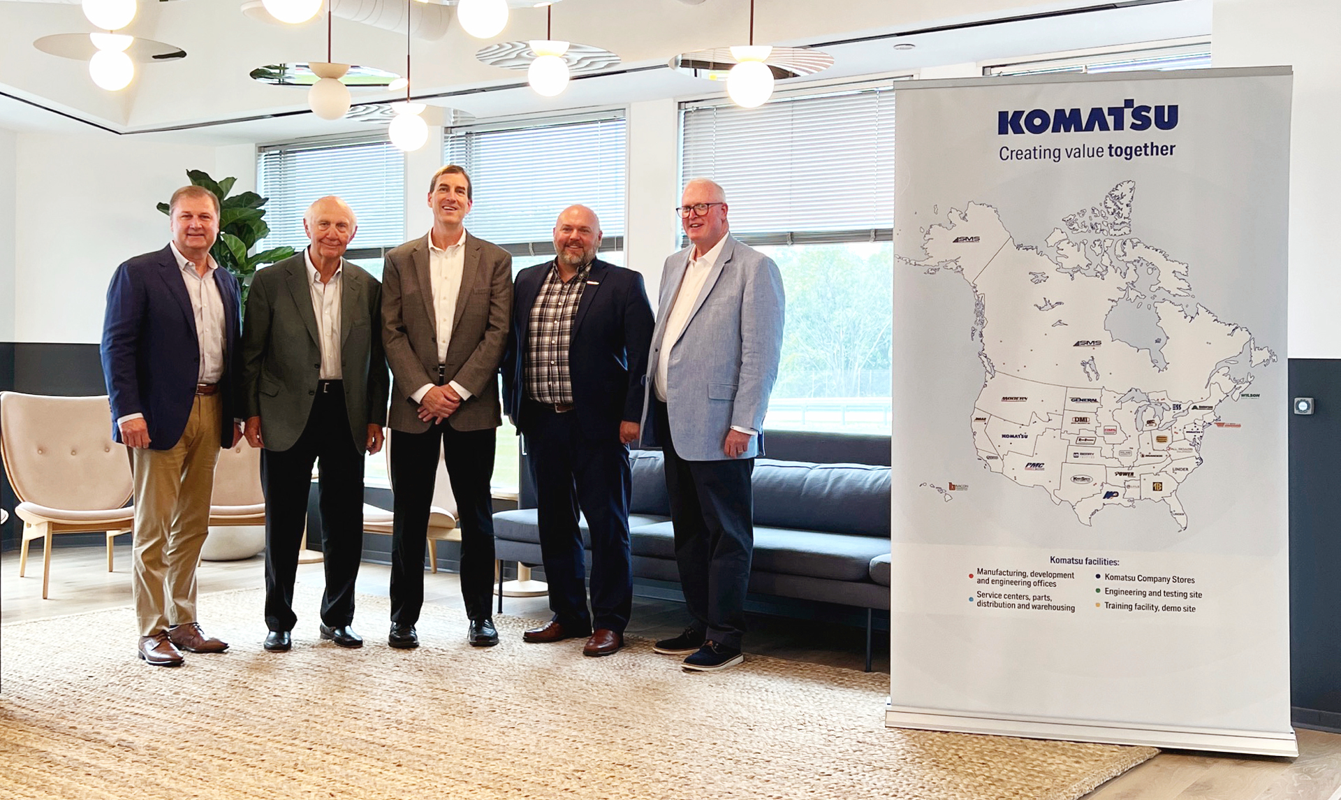 (l to r) Dan Stracener, CEO, Tractor & Equipment Co; Ed Kirby, chairman, Kirby-Smith Machinery; Michael Brennan, president/COO, Bramco; Rod Bull, EVP North America Region, Komatsu; Brian McGuire, president/CEO, AED.