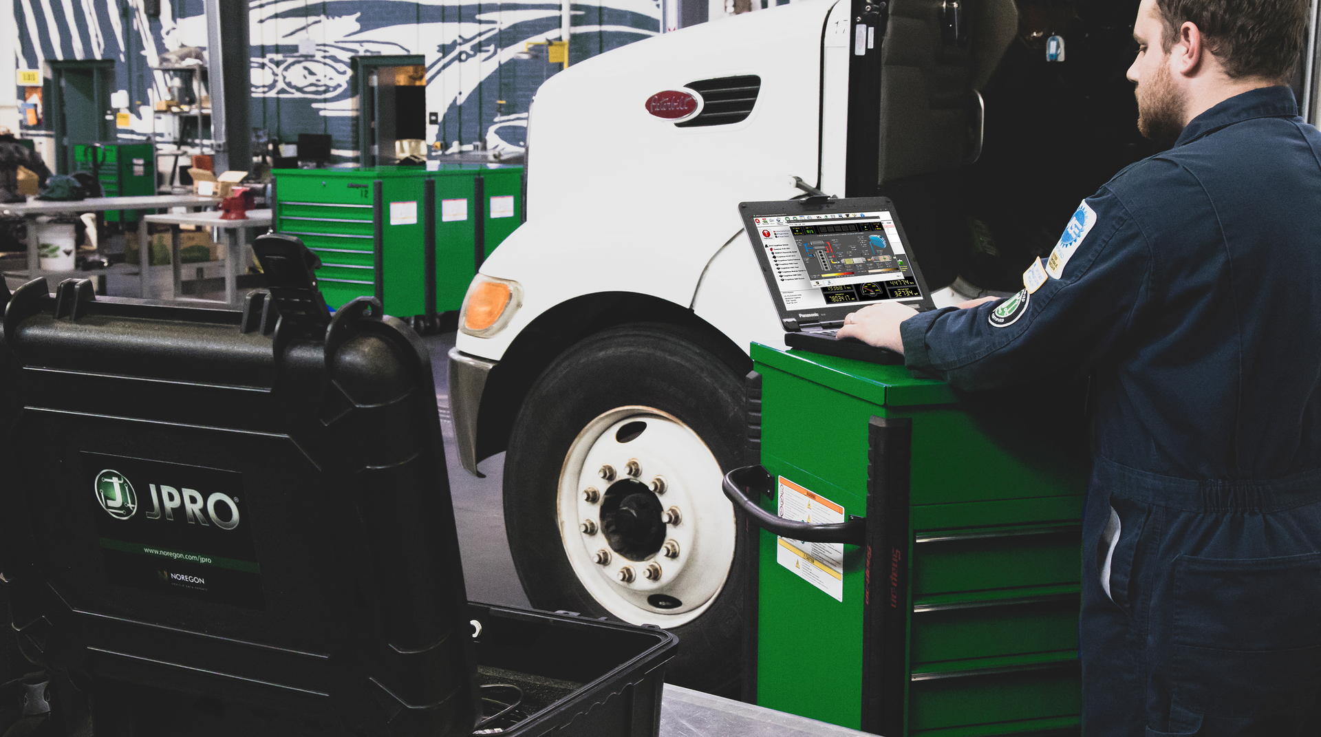 Technician Working On A Truck
