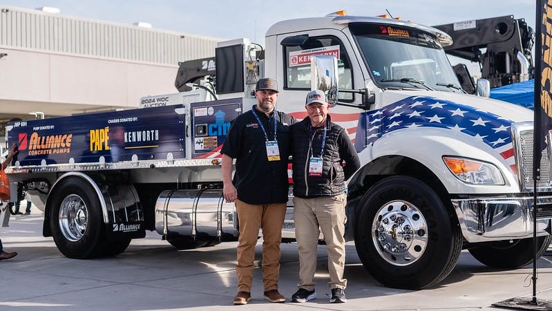 Stevie Ray Lloyd and Steve Lloyd of Lloyd Concrete Services are shown with the Kenworth T280 concrete pump truck.