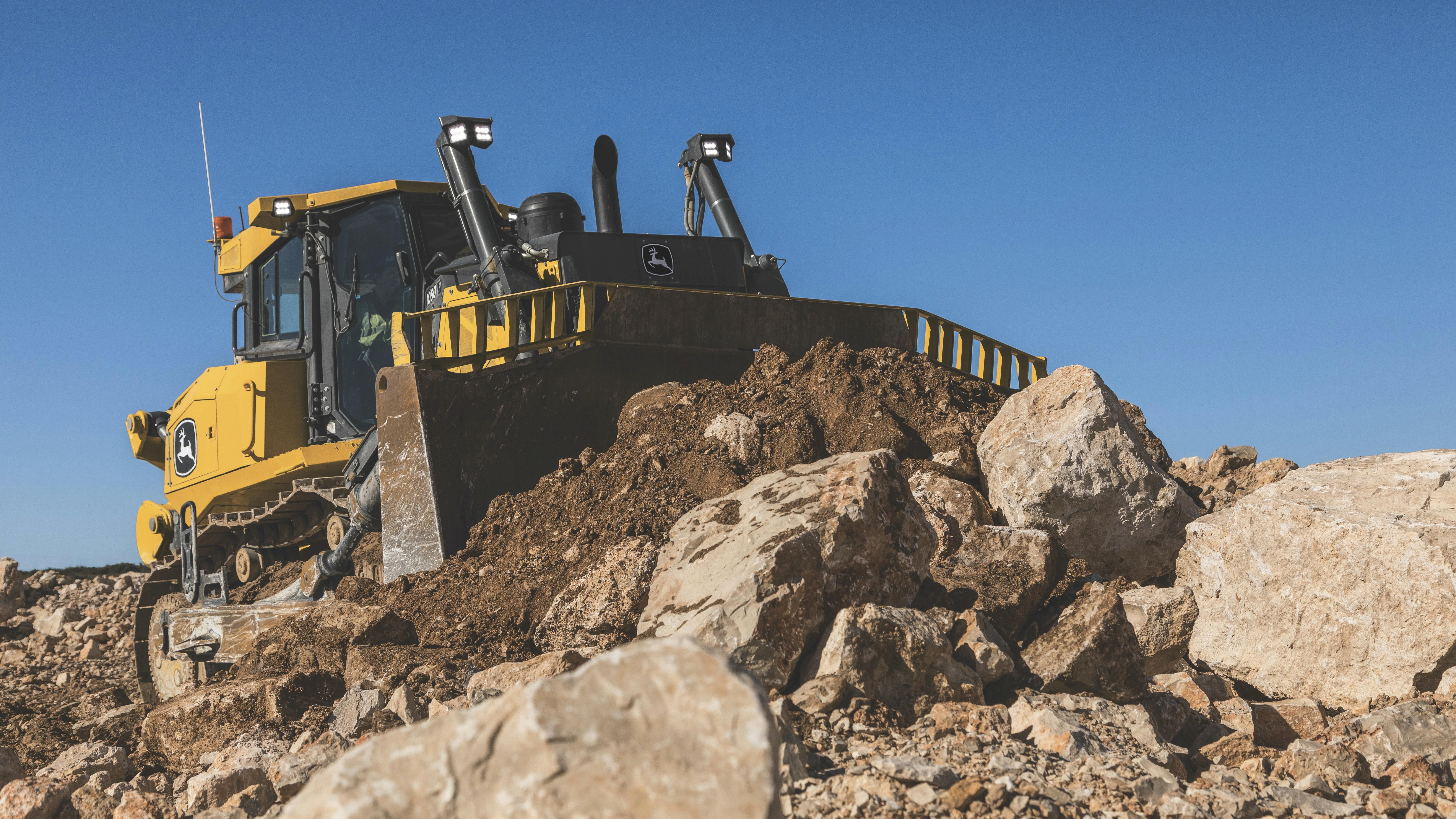 The 354-horsepower Deere 1050 P Tier is the largest dozer in the lineup, with an operating weight range of 94,000 pounds to 94,590 pounds.