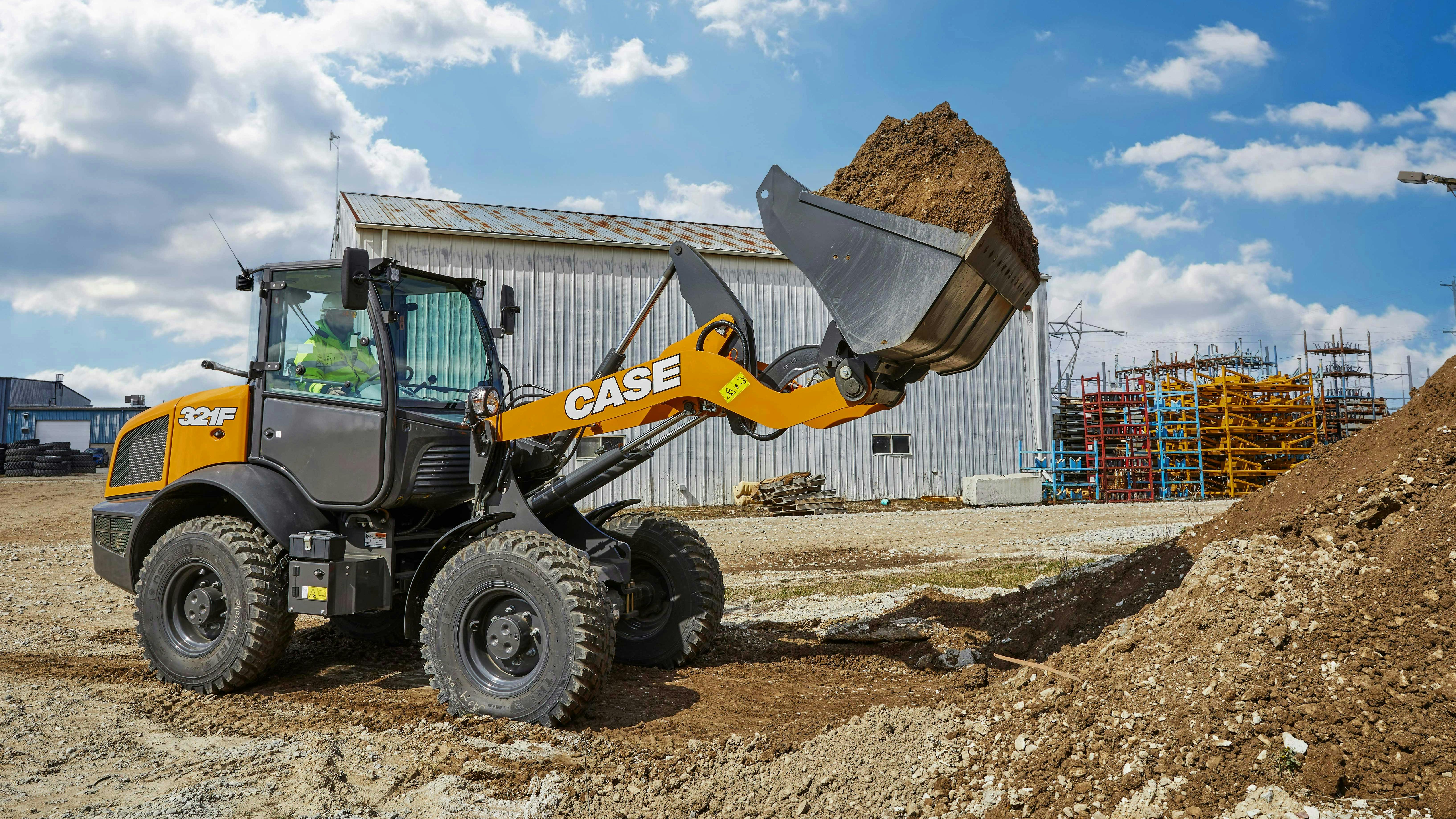 Case 321F wheel loader has an operating weight of 13,303 pounds.