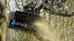 Drum mulcher in action. Drum mulcher in action.