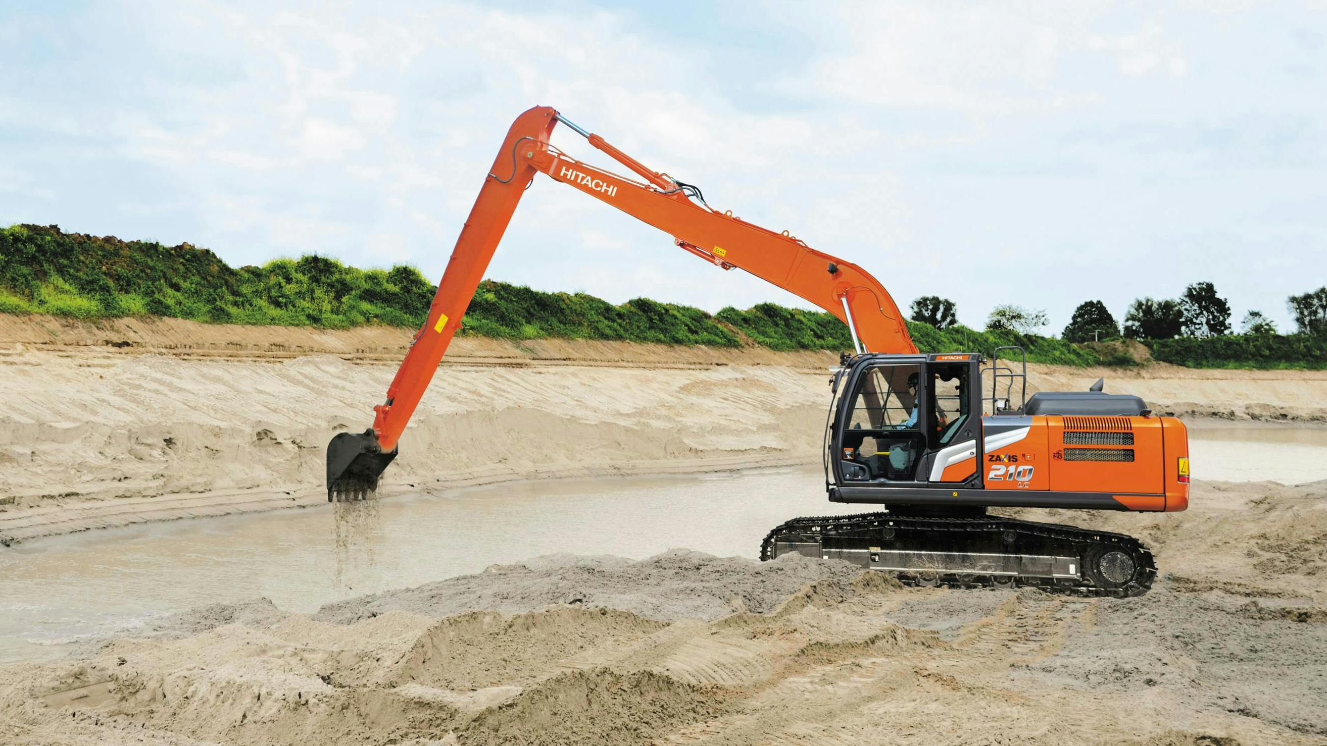 Maximum reach on the super long front excavator is 50 feet 4 inches.