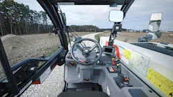 The low-profile boom and mirrors on the operator’s left and right provide visibility on the TL623 telehandler. The low-profile boom and mirrors on the operator’s left and right provide visibility on the TL623 telehandler.
