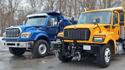 Blue HV615 has a setback steer axle, a longer hood housing an International S13 diesel and a bumper-to-back-of-cab dimension of 115 inches. Shorter yellow HV509, with a 109-inch BBC, has a Cummins L9 and a set-forward steer axle to support heavy snowplow equipment. Its flat-black grille suggests frugality but the truck has highly capable components and a stoutly engineered chassis. Blue HV615 has a setback steer axle, a longer hood housing an International S13 diesel and a bumper-to-back-of-cab dimension of 115 inches. Shorter yellow HV509, with a 109-inch BBC, has a Cummins L9 and a set-forward steer axle to support heavy snowplow equipment. Its flat-black grille suggests frugality but the truck has highly capable components and a stoutly engineered chassis.