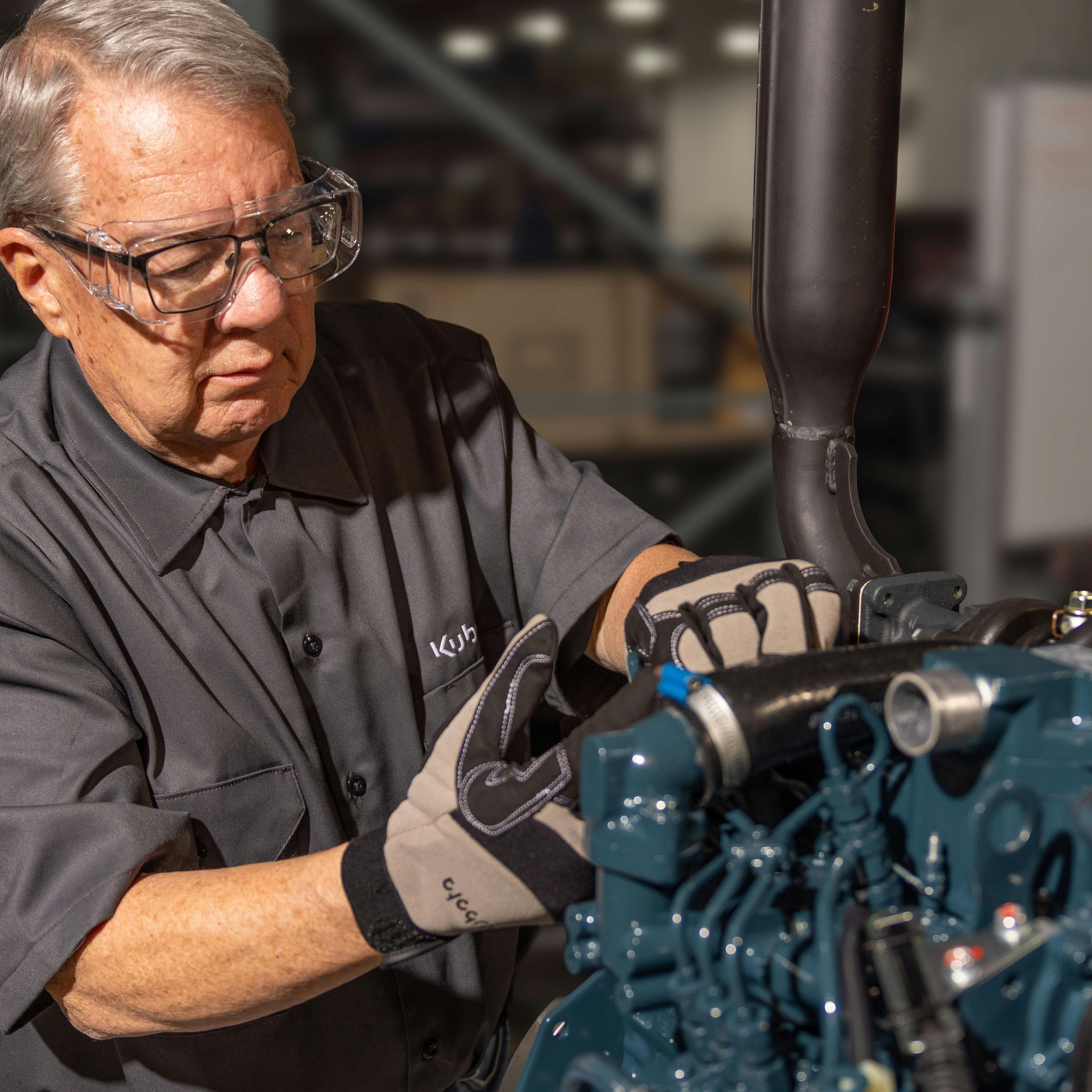 Kubota Engine America diesel engine mechanic doing maintenance