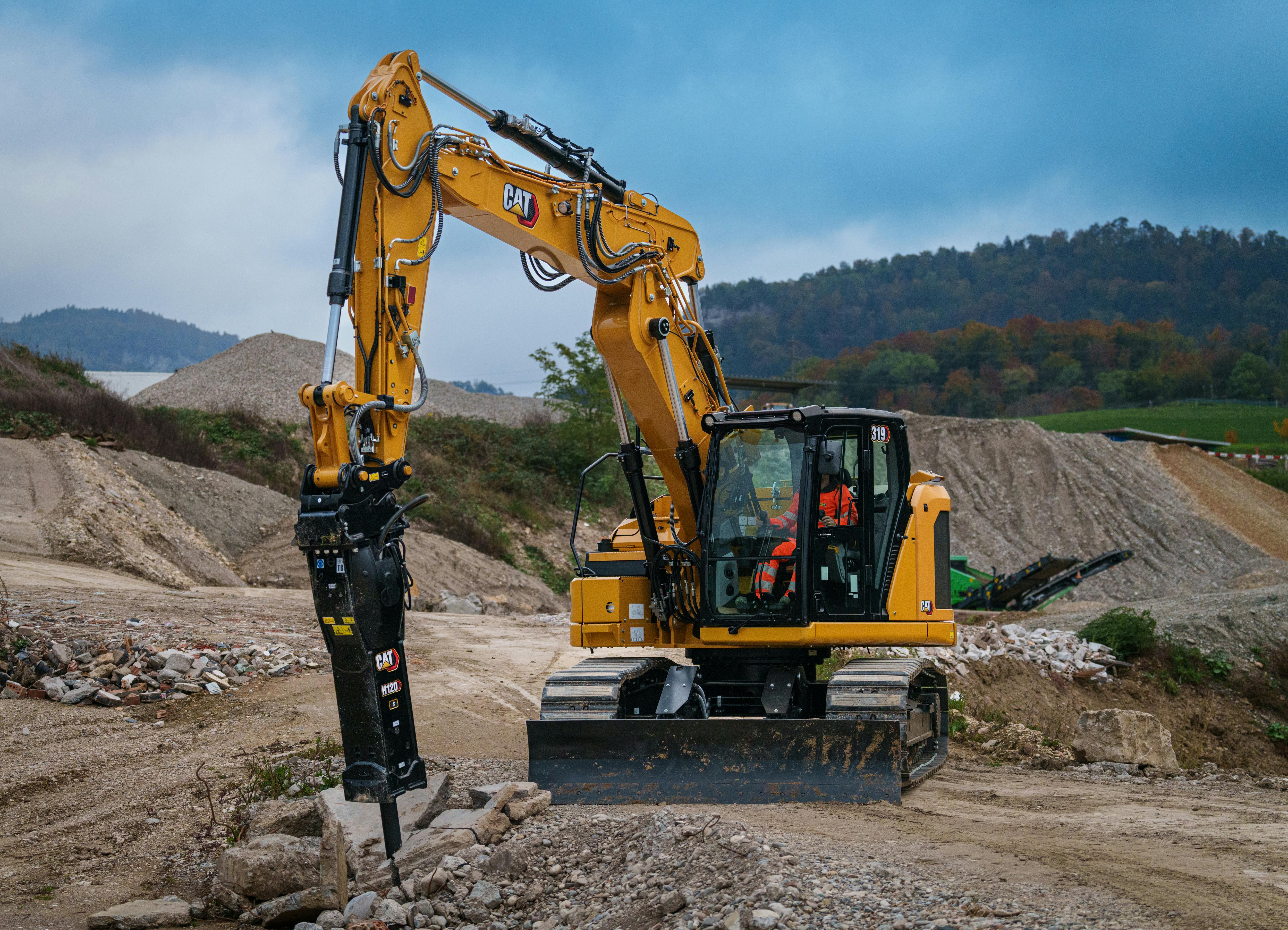 Cat excavator with hammer