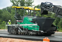 Vögele Products paving being fed asphalt Vögele Products paving being fed asphalt