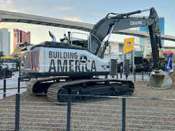 Deere excavator in booth Deere excavator in booth