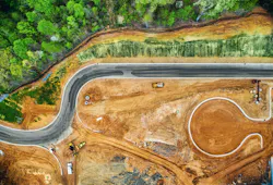 Construction site from above with machines below Construction site from above with machines below