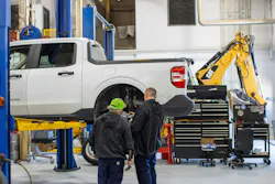 Fleetio repair show with two mechanics checking out a truck Fleetio repair show with two mechanics checking out a truck