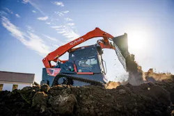 Kubota SVL110-3 Compact Track Loader dumping dirt Kubota SVL110-3 Compact Track Loader dumping dirt