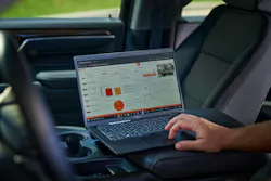 Ditch Witch’s Orange Intel on a laptop in a truck Ditch Witch’s Orange Intel on a laptop in a truck
