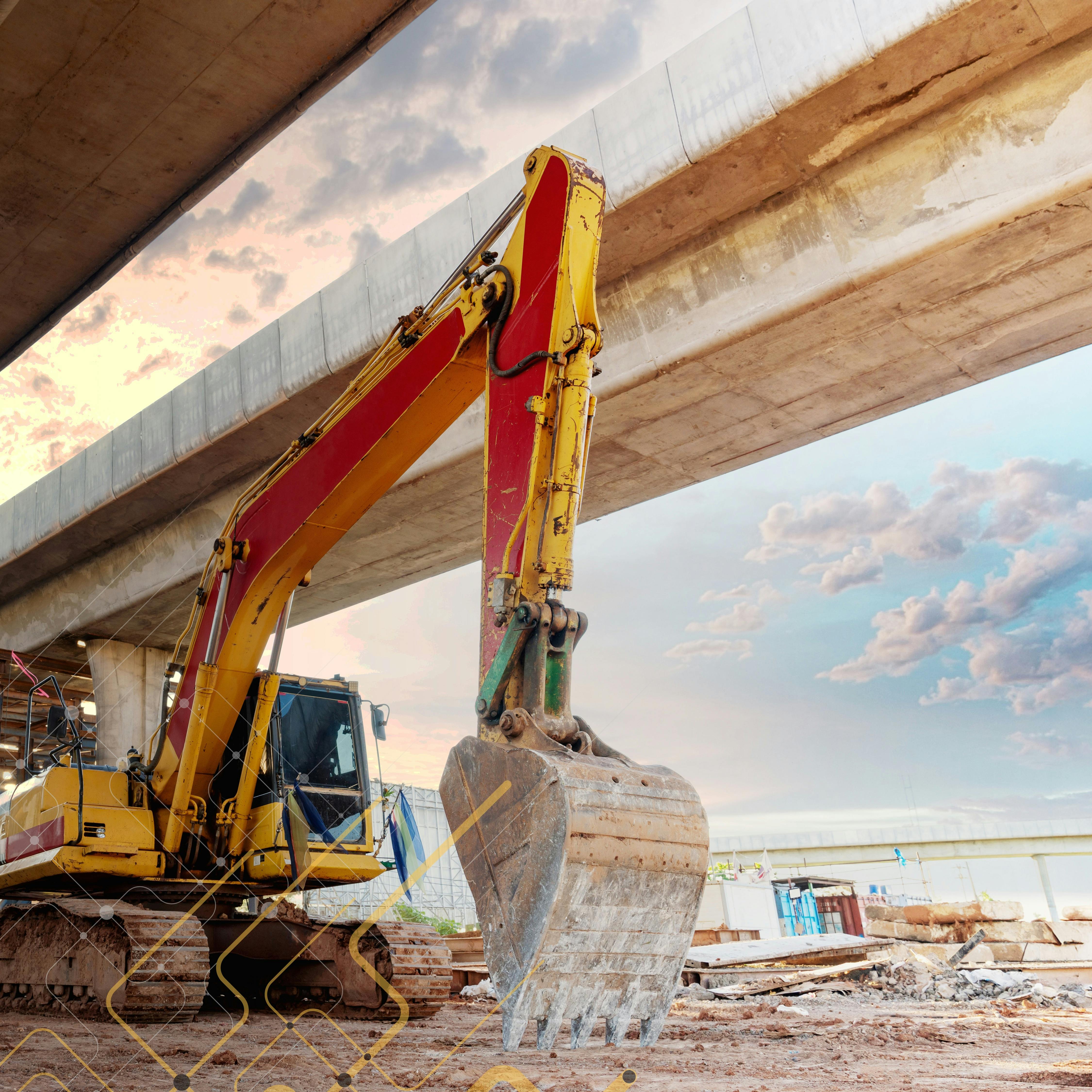 Teletrac Navman data flows into an excavator under a bridge